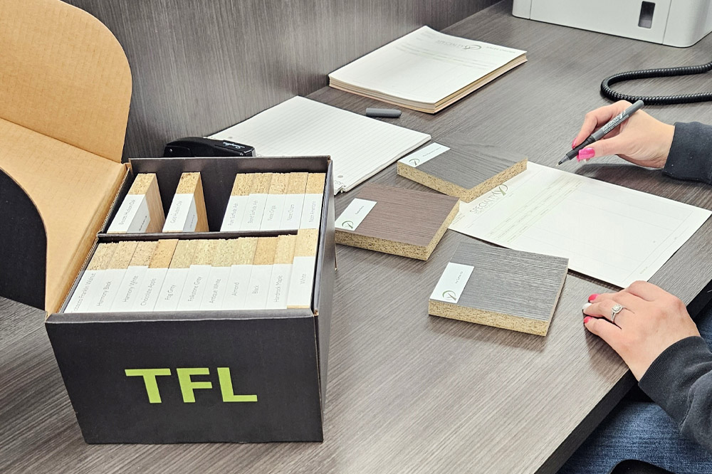 image of a sales representative, presenting wood samples
